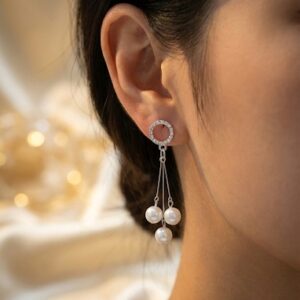 legant pearl drop earrings with silver finish. Lightweight, classy & perfect for parties, weddings & evening wear.