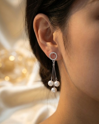 legant pearl drop earrings with silver finish. Lightweight, classy & perfect for parties, weddings & evening wear.