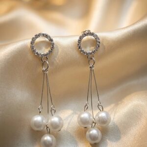legant pearl drop earrings with silver finish. Lightweight, classy & perfect for parties, weddings & evening wear.