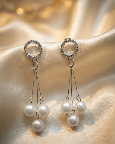 legant pearl drop earrings with silver finish. Lightweight, classy & perfect for parties, weddings & evening wear.