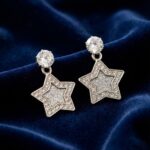 Silver star drop earrings