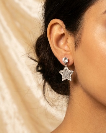 Silver star drop earrings