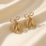 Gold bow drop earrings